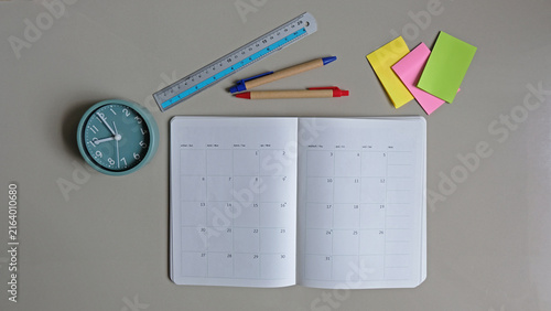 Open sketchbook and creative tools on minimal workspace.