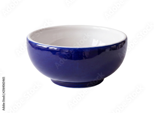 Empty blue ceramic bowl isolated on transparent background, side view glossy cobalt pottery dish for food presentation