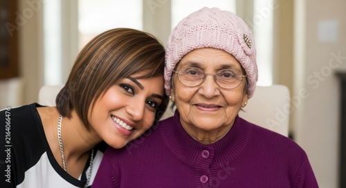 A young woman leaning her head affectionately on her elderly grandmothers shoulder, capturing a tender moment of love, respect, and intergenerational connection