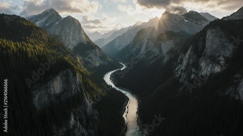 Aerial Cinematic View of Mountain Valley and River at Sunset