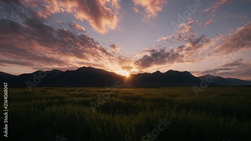 Stunning Golden Hour Sunset Over Mountainous Meadow Landscape
