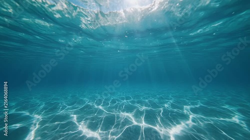Underwater Ocean View with Sunlight Rays Refracting on Sea Floor