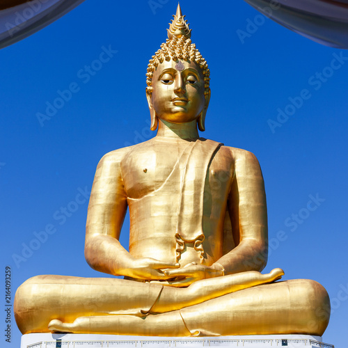 Canvas Print Golden Buddha statue in meditation pose