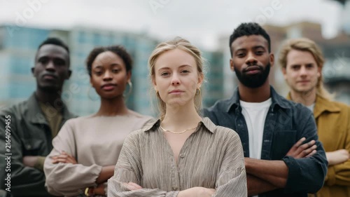 Diverse Group of Confident Young Adults Standing Together Outdoors