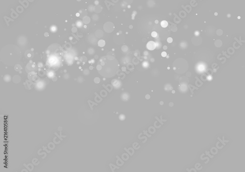 Quadro su tela Scattered glowing white bokeh lights on a black background with soft varying siz