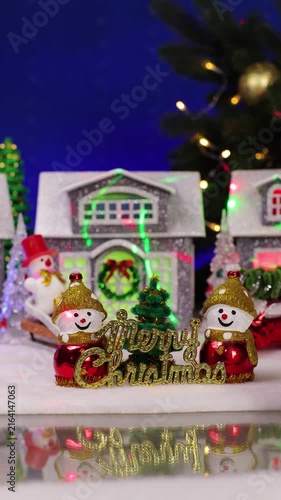 A quirky Santa Claus drops into a Christmas town with letters and snowmen in the foreground