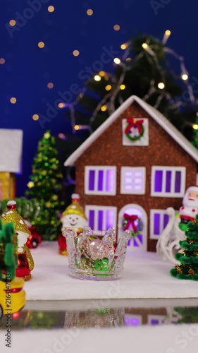 A yellow car drives into Christmas town
