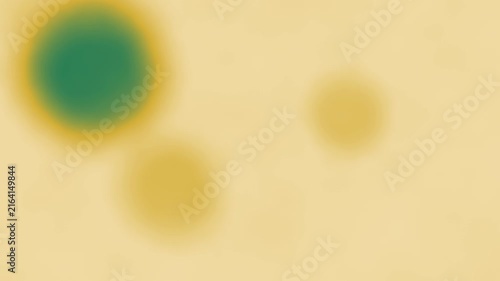 Watercolor ink blooming and spreading, seamless loop motion background, emerald gold