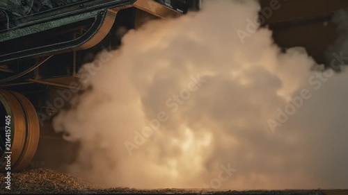Steam engine releasing high pressure vapor from a metal nozzle