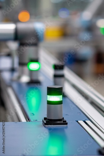 Collaborative robots improving productivity on a small manufacturing line featuring green performance indicators