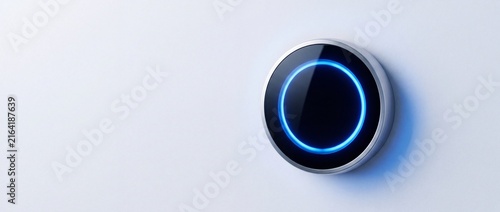 Minimalist circular smart home wall controller with glowing blue led ring interface for intuitive climate lighting or security management