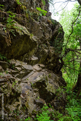 Rocky mountain surface with natural stone texture close-up