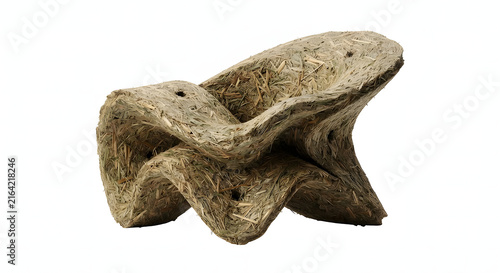 Biophilic organic chair made from hempcrete and straw isolated on white background.
