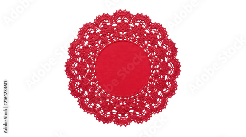Round red crocheted lace doily with solid fabric center isolated on white