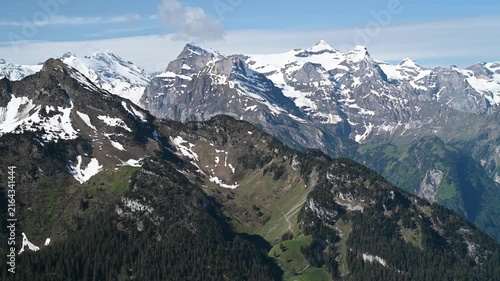 Aerial View of Snow-Capped Swiss Alps Peaks from Stoos Ridge Trail Cinematic Panoramic Landscape