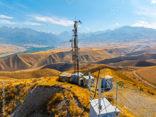 Aerial View of Communication Tower on Arid Hilltop