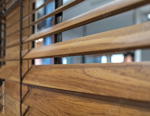 Minimalist wooden screen with contemporary office design elements
