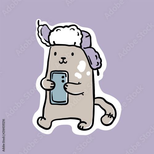 Cartoon-style illustration of a smiling cat wearing a fluffy white and purple knitted hat with earflaps. The cat is holding a blue smartphone in its paws and has a small backpack on. Vector