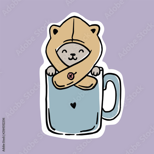 Cartoon-style illustration of a smiling cat wearing a hoodie and peeking out from inside a large blue mug with a black heart design. The cat's face is drawn in the milk foam at the top. Vector