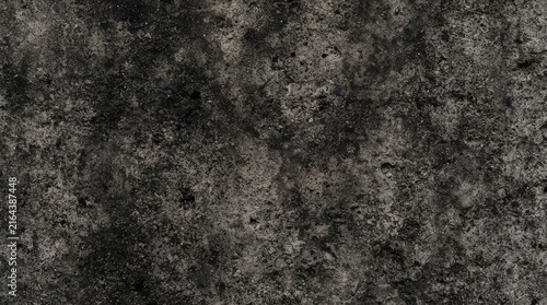 Detailed macro photograph of a dark textured stone surface