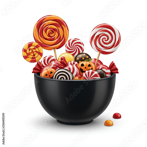 Colorful Lollipops and Candy in Black Bowl.