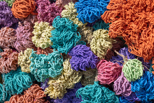 Colorful dried loofah sponges background, Old Market, Sharm El Sheikh Egypt.
