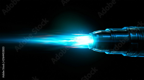 Futuristic energy beam erupting from a metallic nozzle in the dark