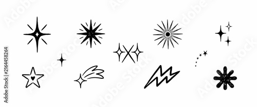 Hand drawn sparkle and star vector set with black ink sketch elements including lightning and cosmic shapes on white.