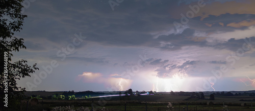 A powerful storm in the sky at night, clouds and lightning