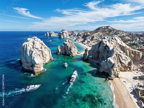 Aerial view of rocky coastline with yachts in Los Cabos Mexico