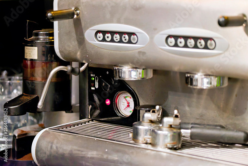 Cuadro en lienzo Close-up of a commercial espresso machine with gauges and buttons