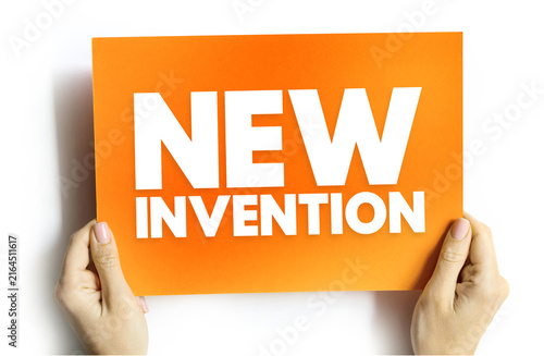 Konstfotografi NEW INVENTION text on card held by hands