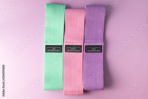 Woven fabric, elastic exercise resistance bands for hips in three stretch strengths