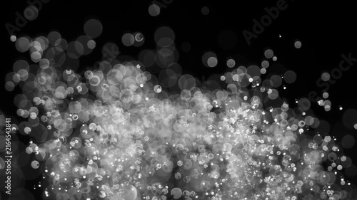 Floating abstract particle bokeh on dark background. Shot on super slow motion camera 1000 fps.