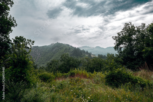 Foggy green mountains and forest landscape near Visegrad, Bosnia and Herzegovina, under a cloudy summer sky