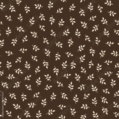 Seamless botanical pattern with small cream leafy branches scattered across a deep brown background. Elegant minimal nature design with a warm autumn feel.