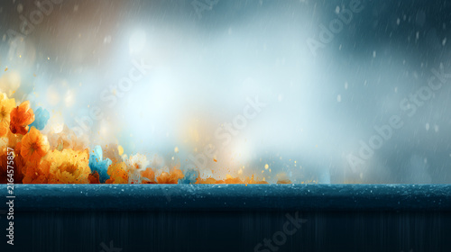 Empty wooden table surface with glowing autumn flowers and soft misty background