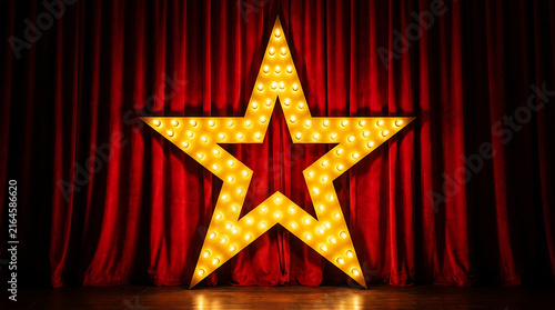 Illuminated Golden Marquee Light Star on Red Velvet Stage