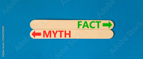 Fact or myth words symbol. Concept words Myth and Fact on beautiful wooden sticks. Beautiful blue background. Business and fact or myth concept. Copy space.