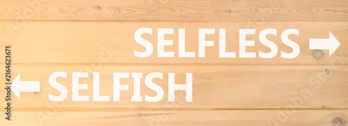 фотографія Selfless instead selfish words symbol