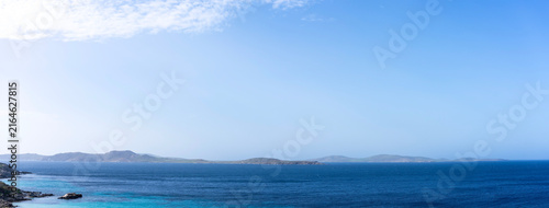 Delos seen from Mykonos on a sunny winter day