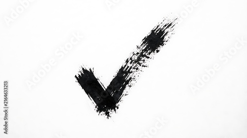 Bold black checkmark brushstroke on a white background representing confirmation approval success and positive affirmation with a textured aesthetic