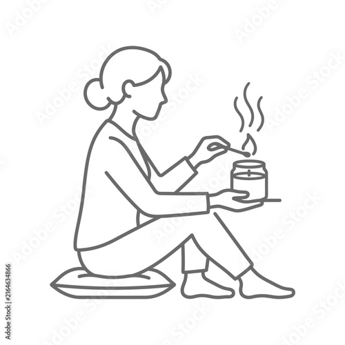 Woman holding a steaming mug.
