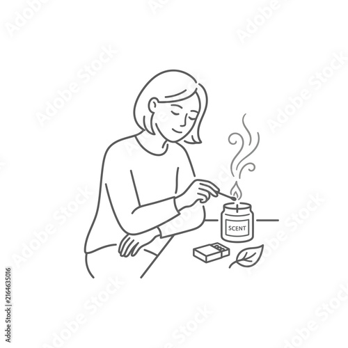 Woman lighting scented candle with matches.