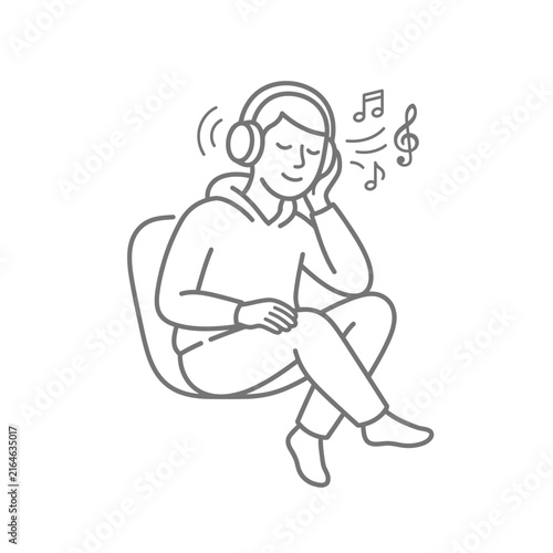 Woman listening to music with headphones.