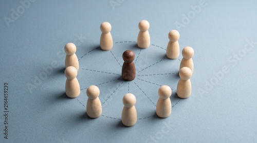 Wooden Leader Standing Inside Circle of Team People on Blue Gray Background, Leadership, Teamwork, Business Management, Community, Human Resources, Organization, Collaboration and Employee Support Con