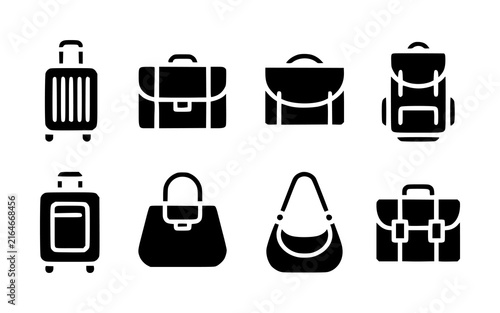 Set of eight black silhouette representing various types of travel luggage, bags, and briefcases