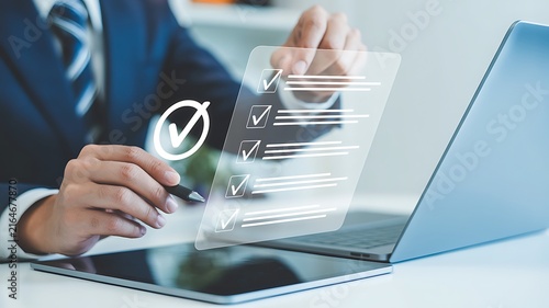Businessman uses a tablet to complete a digital checklist.