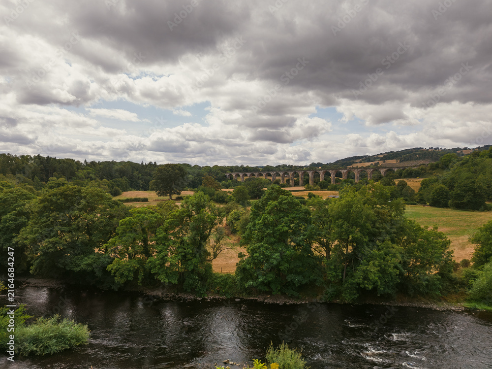 Fototapeta premium Lush Green River Landscape Near Pontcysyllte Aqueduct, Wales