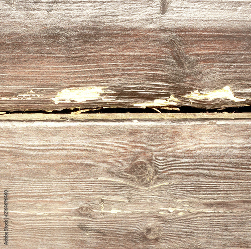 Obraz na plátně Weathered Dark Brown Wood Planks with Flaking Varnish and Splintered Gap